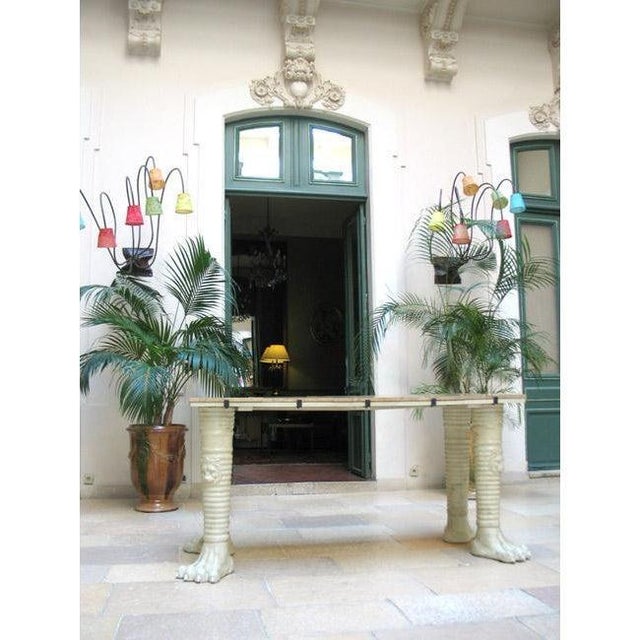 Exceptional and large French Neoclassical console attributed to Jean-Charles Moreux, white lacquered plaster claws-ended...