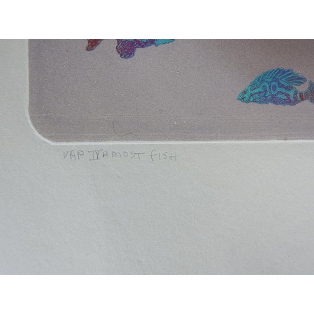 1983 color etching on light gray paper of numerous colorful exotic fish by Walter Crump (20th, 21st century)...