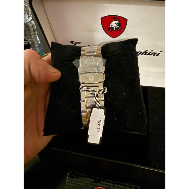 TONINO LAMBORGHINI EN045.301 watch NWT Brand new with box and tags The TONINO LAMBORGHINI EN045.301 watch is a stylish...