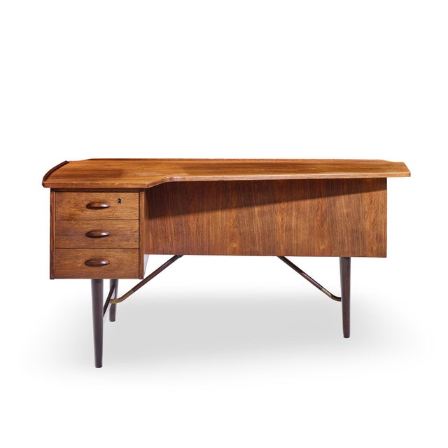 Peter Lovig Nielsen Mid Century Danish Rosewood Boomerang Desk This desk measures: 58.5 wide x 34.75 deep x 28.25 high,...