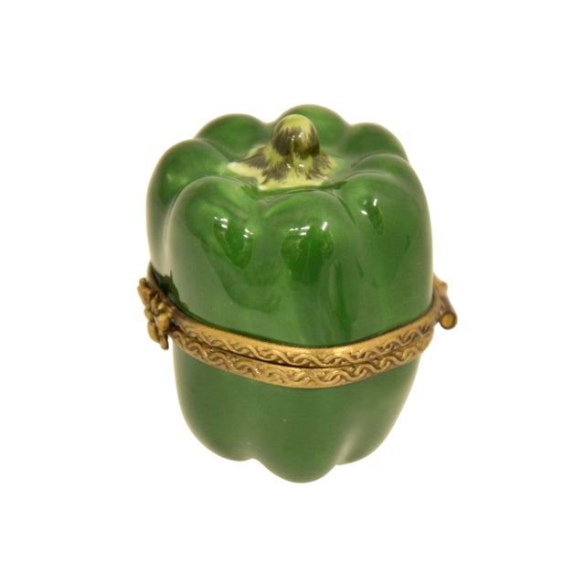 Vintage Limoges of France trinket accent box designed as a vibrant green pepper with a green and brown stem and a gold...