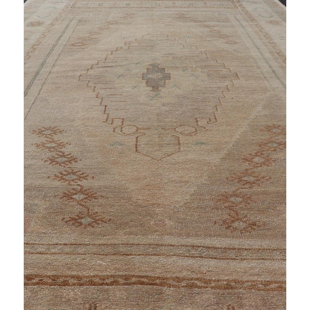 Mid 20th Century Vintage Oushak Rug From Turkey With Muted Colors and Tribal Medallion For Sale - Image 5 of 11