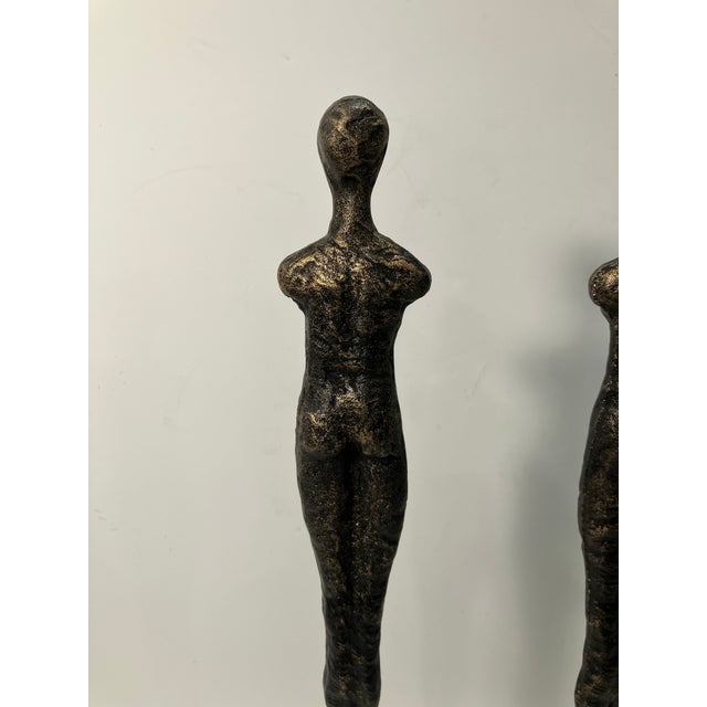 This 20 inch high pair of sculptures in iron have a bronze finish to them These were inspired by the sculpture of Diego...