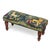 Meticulously handcrafted in the United Kingdom, this upholstered stool boasts classic studding and hand-polished solid...