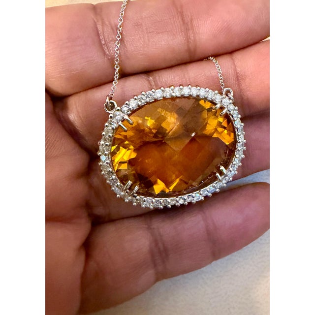 Natural 48 Carat Oval Citrine &amp; Diamond Pendant 14 Karat White Gold Necklace with Chain This spectacular Pendant...