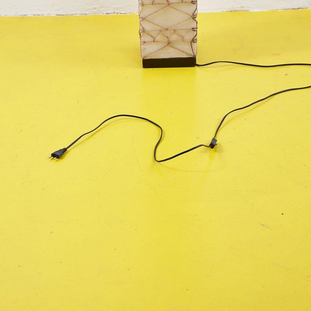 Floor lamp in plastic resin and rope height: 164 width: 20 depth: 20 this piece is attributed to the mentioned...