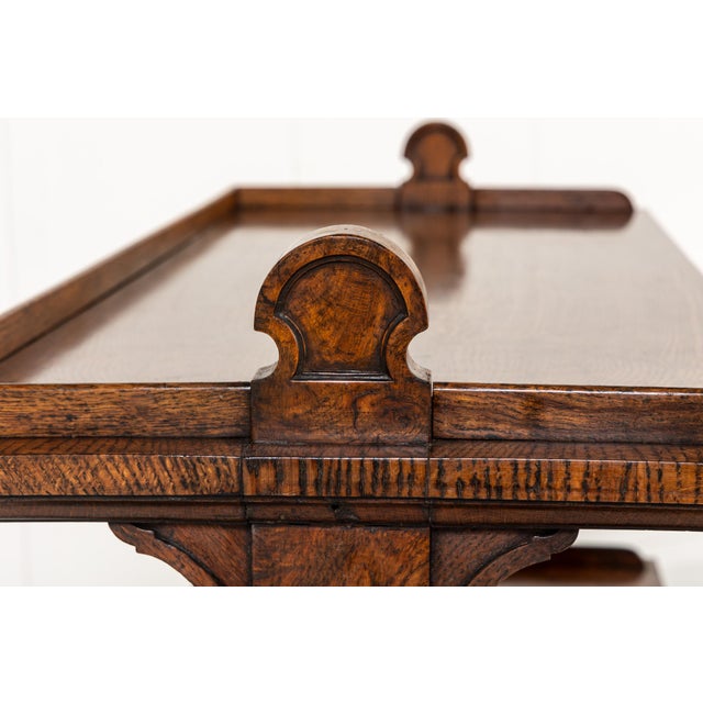 An Early 19th Century English Oak Dumb Waiter or WhatNot. Derived from the French étagère this is essentially a pair of...
