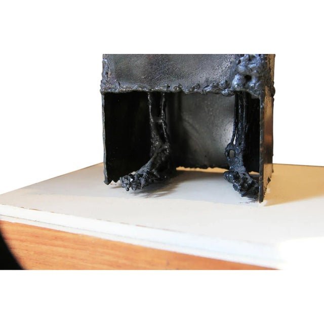 Modern abstract brutalist metal sculpture by Houston artist Bob Fowler. The work features a skeletal figure welded in a...