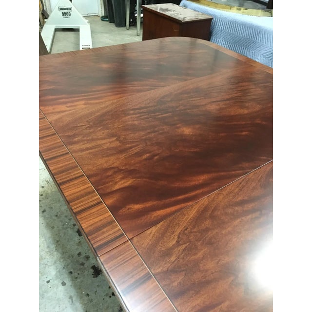 This is a made-to-order Traditional mahogany dining table made in the Leighton Hall shop. It features a field of slip-...