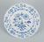 Meissen, Germany. A set of three Blue Onion Pattern dinner plates in porcelain. Hand-painted. First half of the 20th...