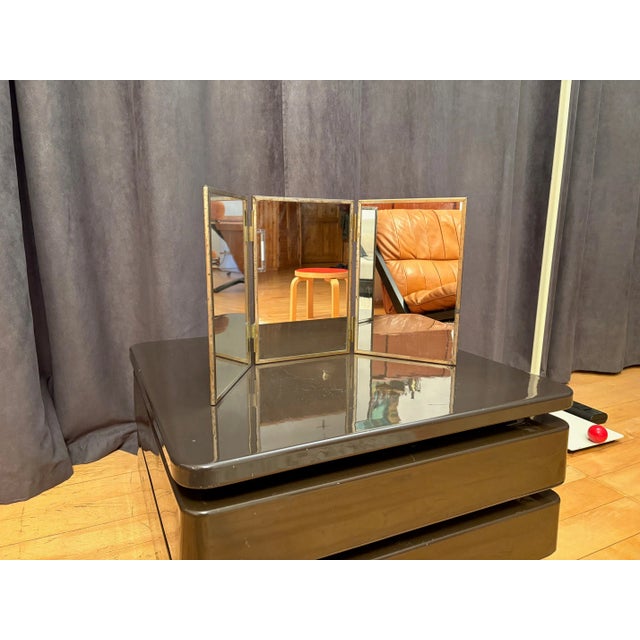 A triptych of mirrors from the 1930s. In original and good condition. An attractive and very practical interior design...