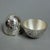Elegant and refined, this egg-shaped box represents a classic of Italian artisanal silverware, perfect as a collector's...