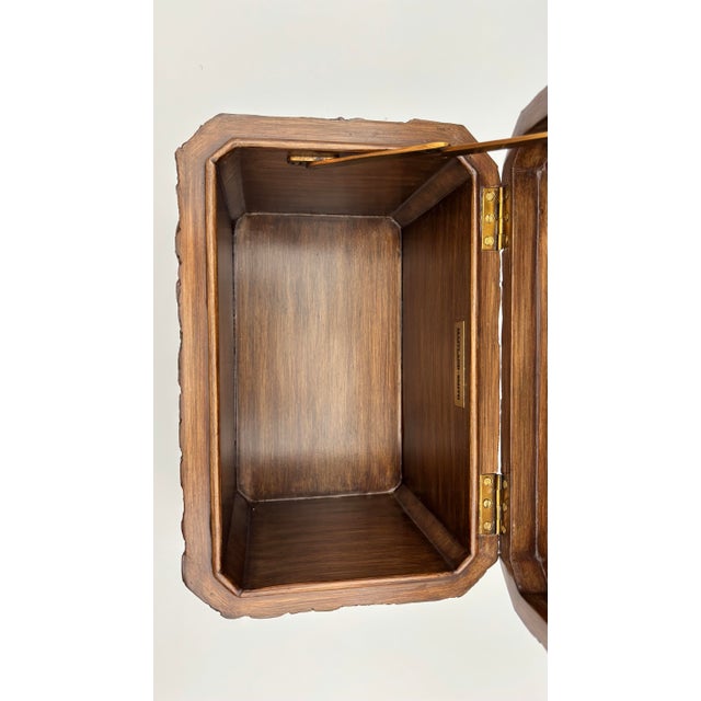 This unusual piece features a textured faux bark / coconut shell-style exterior finish in a rich dark brown tone, accented...