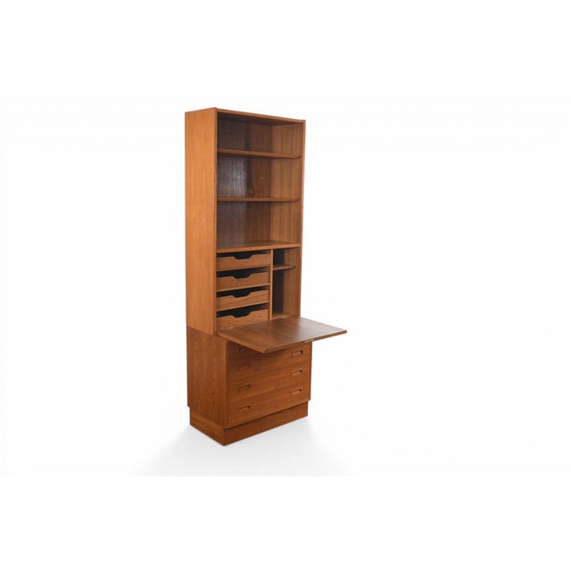 Origin: Denmark Designer: Carlo Jensen Manufacturer: Hundevad + Co Era: 1960s Materials: Teak Measurements: 42.5" wide x...