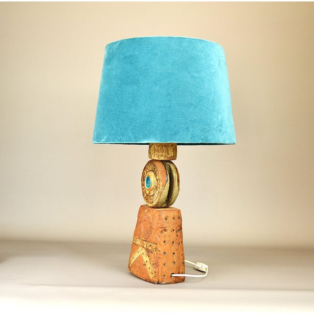 A rare ceramic table lamp designed by Bernard Rooke, England 1960s. The sculpture is handmade from ceramic elements in...