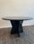 Stunning black granite dining table with bits of blue iridescent flecks. The table is in impeccable condition and can be...