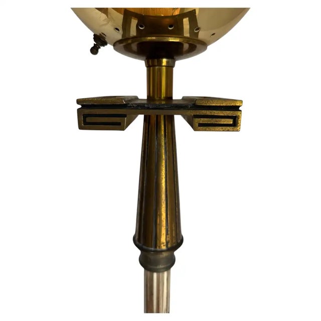 A striking Tommi Parzinger style torchiere floor lamp manufactured by Stiffel Lamp Company during the 1960s. This...