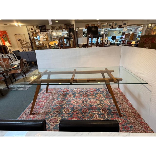 Design Plus Gallery presents a Walnut Wood + Glass Dining Table by Organic Modernism. The table is composed of two pieces;...