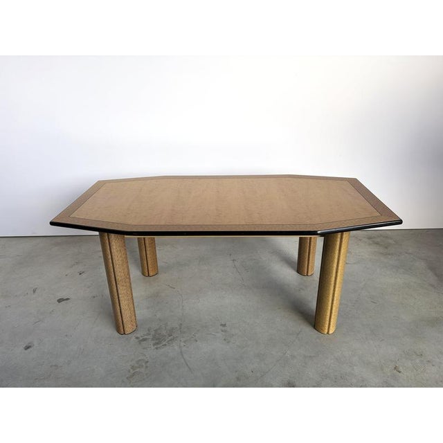 Vintage burl wood dining table made from burl wood. Beautiful natural burl wood troughout with black lining and 4 slotted...