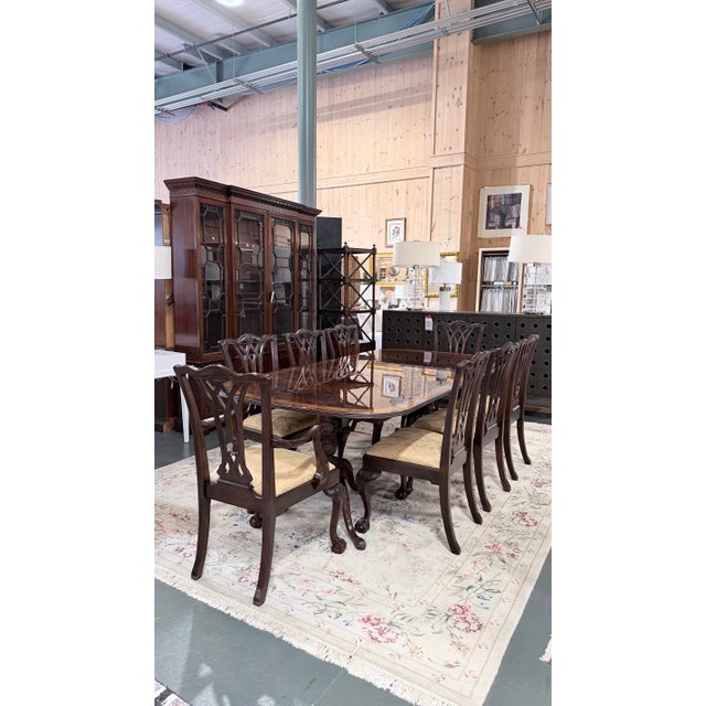 A distinguished Drexel Heritage dining set that captures the timeless refinement of Georgian design with exceptional...