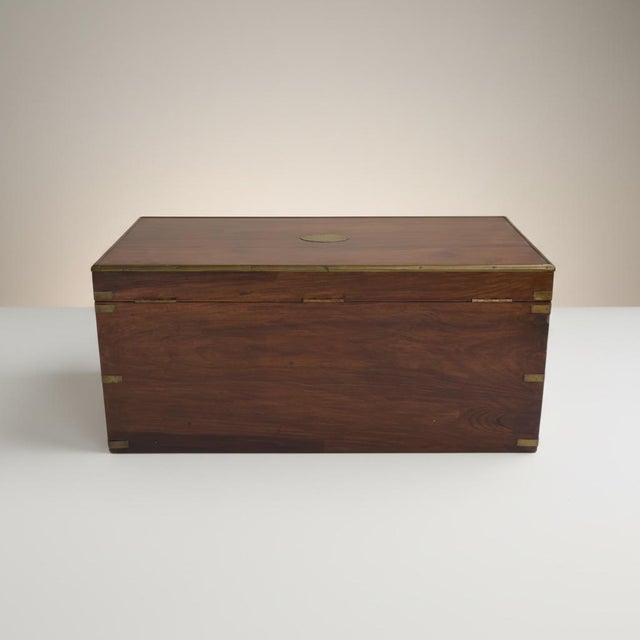 This is an early 20th century English brass bound mahogany campaign style box or trunk. Perfect for the Victorian horse...