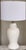 In a designer's favorite form, we present a creamy white vintage ceramic ginger jar lamp with original brass connectors...