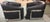 Pair or Restoration Hardware black leather swivel lounge chairs featuring sleek polished chrome frames and a low-profile,...