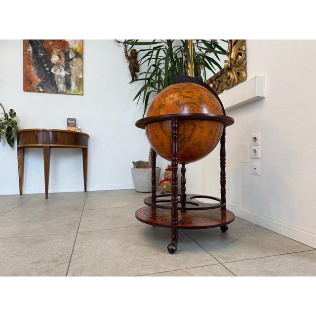 Globe Bar Cabinet/Bar Cart Dimensions: Height 95 x Diameter 55 cm. For sale is an exceptionally stylish bar cabinet in the...