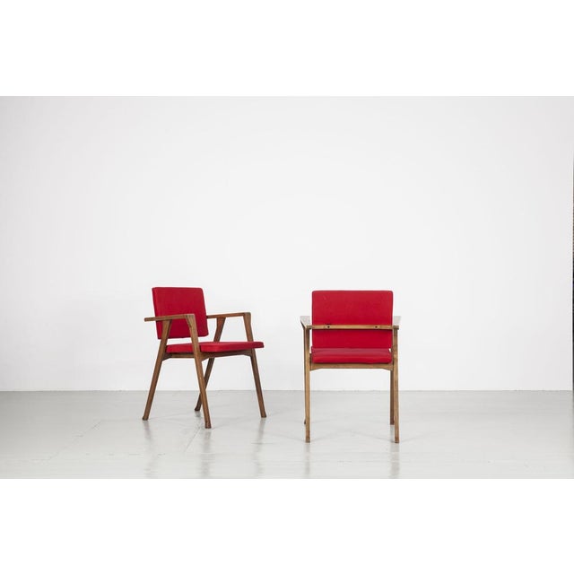 This set of two Italian chairs was designed by Franco Albini for Poggi in the 1950s. The "Luisa" model is a simple,...