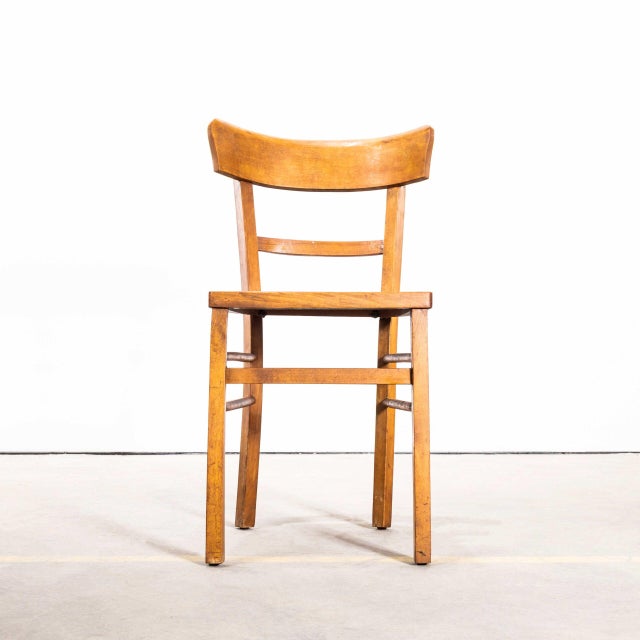 1950’s Simple Warm Oak Bentwood Café Chairs. Classic bistro chair made in France by the maker Baumann. Baumann is a...