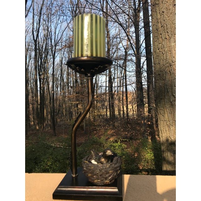 A unique Bronze Candle holder. The nest, including her four eggs, rests on a solid brass rectangle base. Beautiful detail....