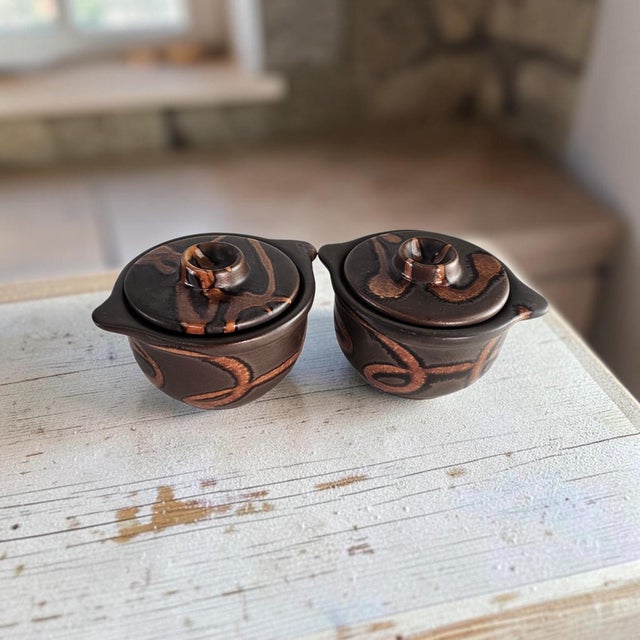 A matched pair of Laurentian Pottery No. 370 individual covered soup bowls or bean pots, produced in Quebec, Canada, circa...