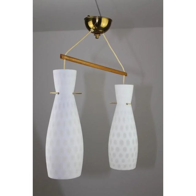 RAAK Chandelier by Aloys Gangkofner for Peill & Putzler, 1960s, in Very Good conditions. Designed 1960 to 1969 I have...