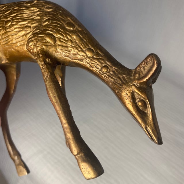 Bring a touch of woodland elegance and vintage character to your space with this beautiful Mid-Century Modern solid brass...