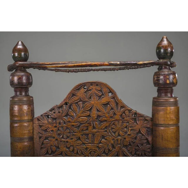 Early 20th century nuristani hand-carved cedar chair – rare tribal artifact this extraordinary low cedar chair is a unique...