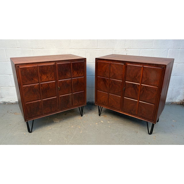 Striking pair of vintage mid-century modern burled walnut cabinets featuring beautifully figured wood grain, sculpted...