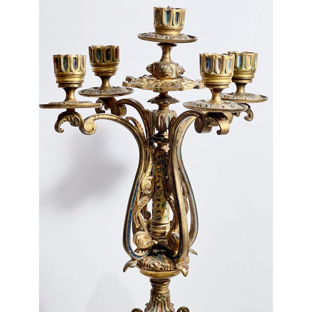 Pair of antique French 22" tall gilt bronze candelabras from a Church Estate in New York circa 1860-1885. This handsome...