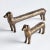 Made of a heavy cast aluminum, this set of regal dachshund sculptures are worthy of a prime bookshelf spot. With abstract,...