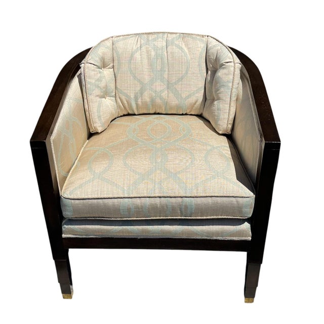 Pair of chic, Art Deco, low-back tub chairs with loose back and seat cushions. This pair of curved chairs have a gently...