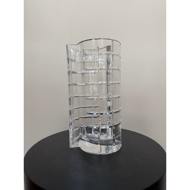 1980s Tiffany & Co. sculptural cut crystal vase, made in Italy and signed to the underside. The deeply cut “windowpane”...