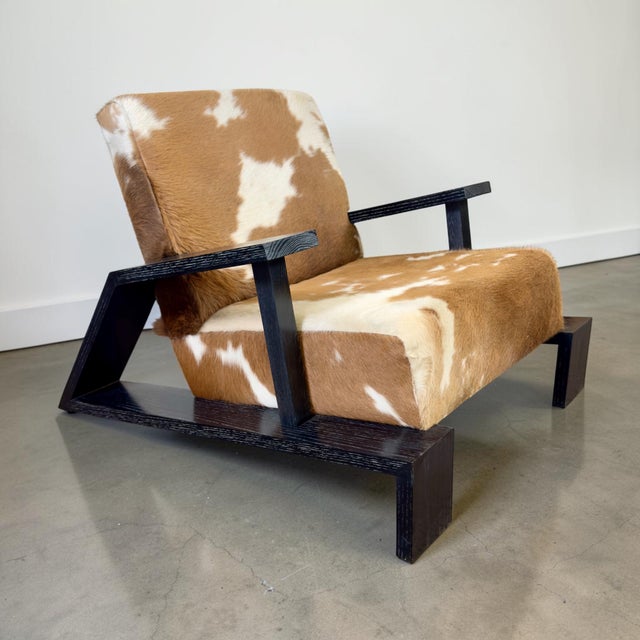 Presented is a striking pair of sculptural lounge chairs crafted in the manner of Jean-Michel Frank, inspired by his...
