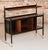 Mid Century G-plan 'Tola and black' -range bookcase model 8726, circa 1960s. Made in African tola with black lacquer and...