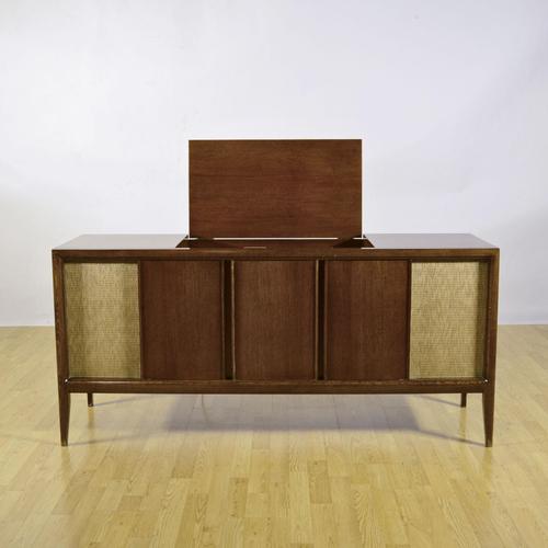 This imposing vintage admiral stereo console represents a technological and aesthetic pinnacle of the 1950s, an era when...