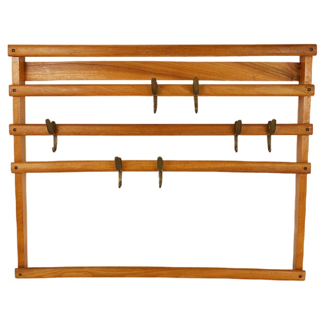 Mid-Century Coat Rack in Beech with 8 Brass Hooks attributed to Carl Auböck, 1950s For Sale