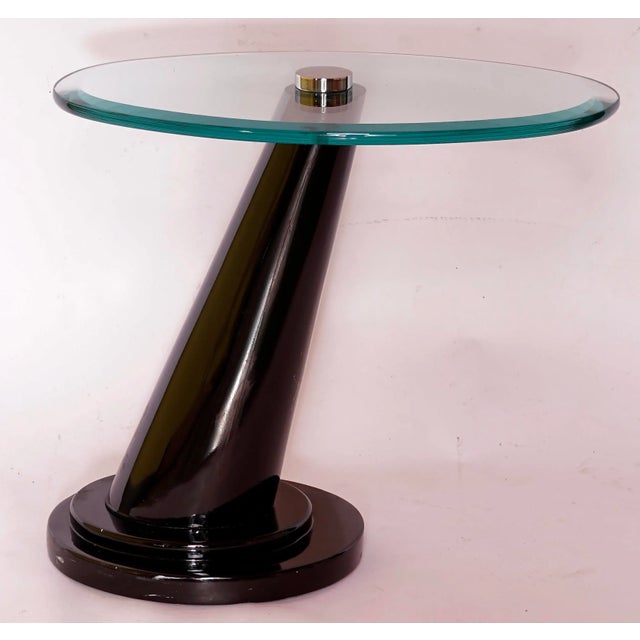 Contemporary Chrome and Glass Cantilever Side Table will pair well with a sofa or two accent chairs.