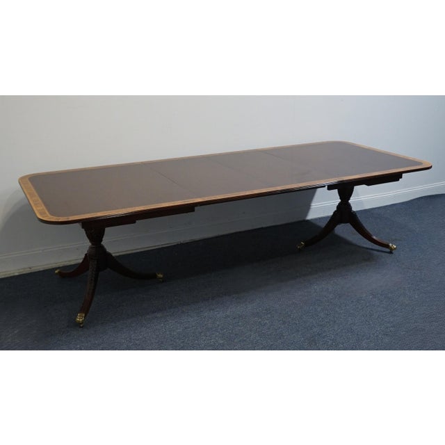 SUTTON FURNITURE Banded Mahogany Traditional Duncan Phyfe Style 112" Double Pedestal Dining Table 29.5" High 72.5" Wide...