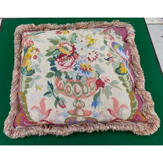 A beautiful hand-stitched needlepoint pillow with a classic French Country or Aubusson style design. The front depicts a...