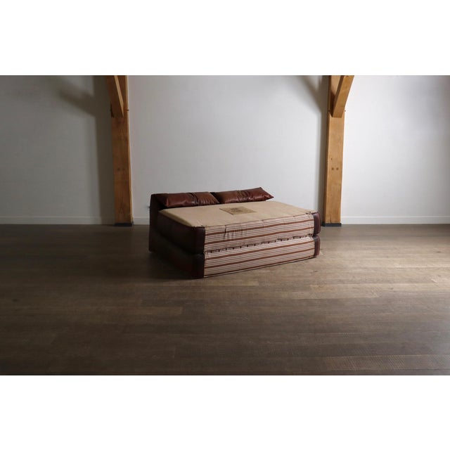 The iconic “le bambole” collection by mario bellini also features this amazing kingsize foldable bed: “the bambolettone”....