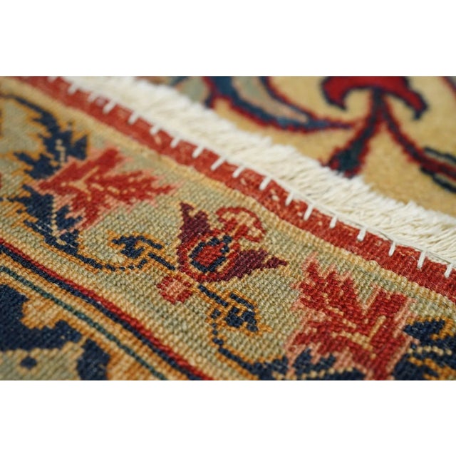 The very unusual ecru border features rectangular red cartouches Alternating with staw finialed small octogrammed,...