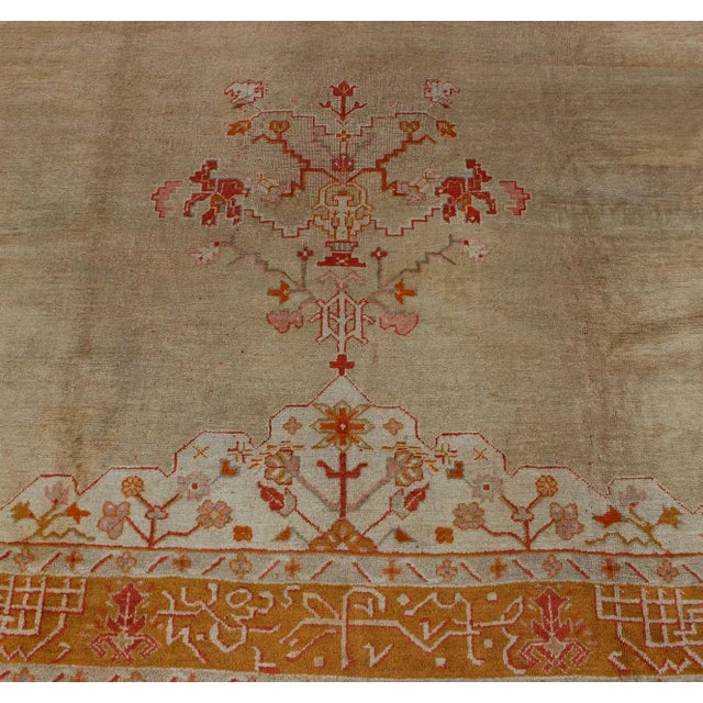 Shabby Chic Large Antique Oushak Rug in Taupe / Light Green Background and Red Border For Sale - Image 3 of 12